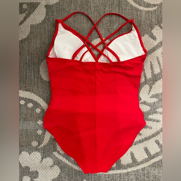 One piece red ruched swimsuit.  Tag has been removed.  Size Large - Picture 2 of 2
